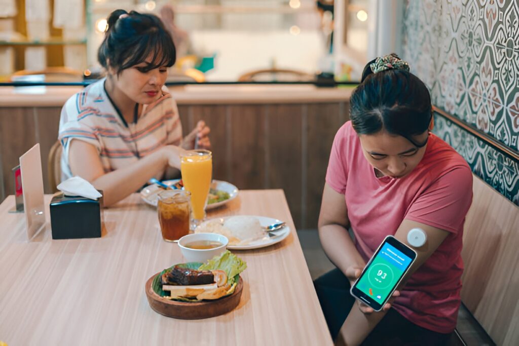 Woman monitoring blood sugar with a CGM for lifestyle diabetes management