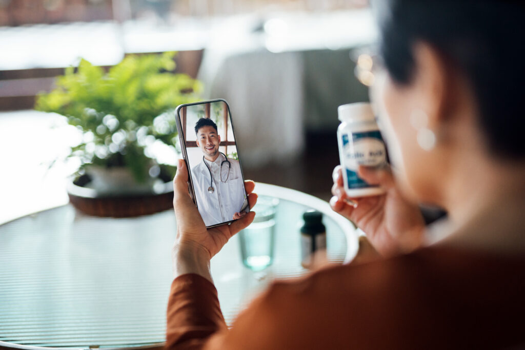 Virtual Diabetes Care consultation on a smartphone with a doctor.